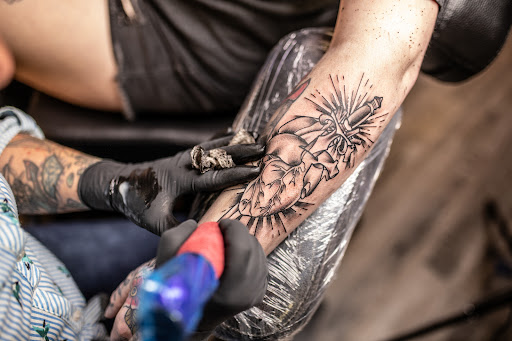 Explore ideas for leg tattoos, creative tattoo ideas in Leesville, available at Revolution Ink Tattoo and Art Gallery