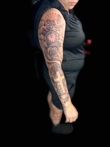 Explore cherry blossom tattoo ideas, creative tattoo ideas in Fort Pierce, available at Xotic Empire Tattoos