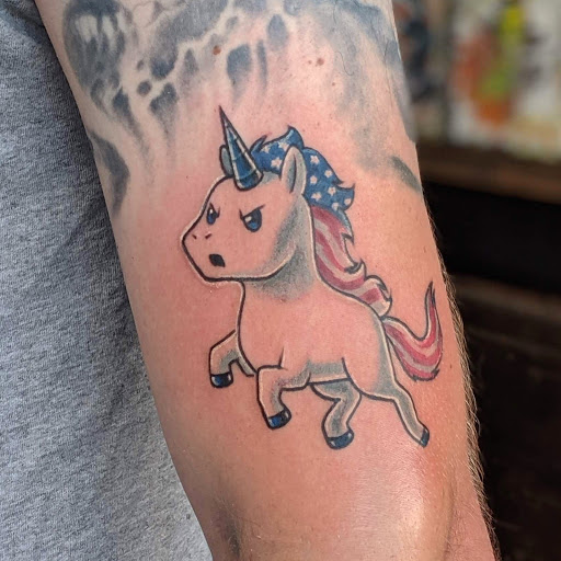 Find music notes tattoo ideas for your next unique tattoo in Dayton at 33 Lions Tattoo
