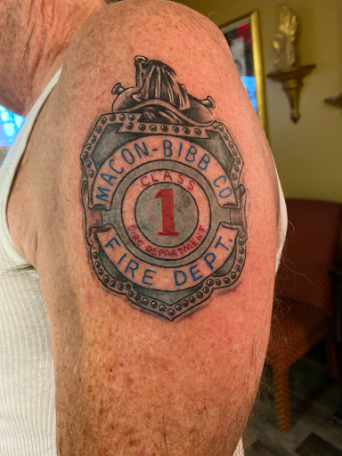 Explore resident evil tattoo ideas, creative tattoo ideas in Warner Robins, available at Untold Pain Tattoo Studio