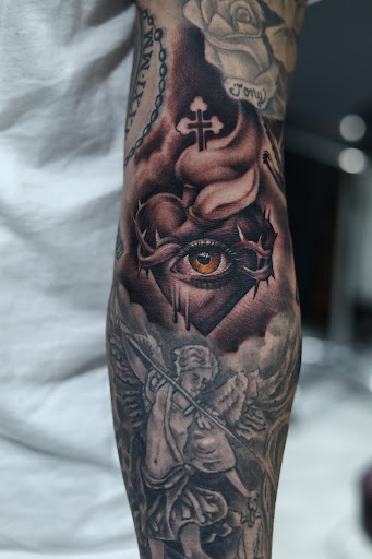 Explore pistol tattoo ideas, creative tattoo ideas in Southfield, available at Enki Tattoo