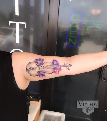 Find cute sloth tattoo ideas for your next unique tattoo in Ormond Beach at Virtue Studios