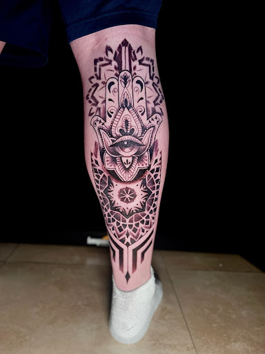 Explore angel neck tattoo ideas, creative tattoo ideas in Venice, available at Ink Monkey Tattoo and Piercing