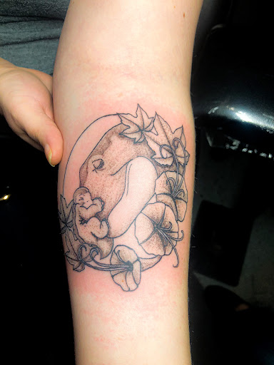 Explore painting tattoo ideas, creative tattoo ideas in Bowling Green, available at Ink Therapy and Body Piercing