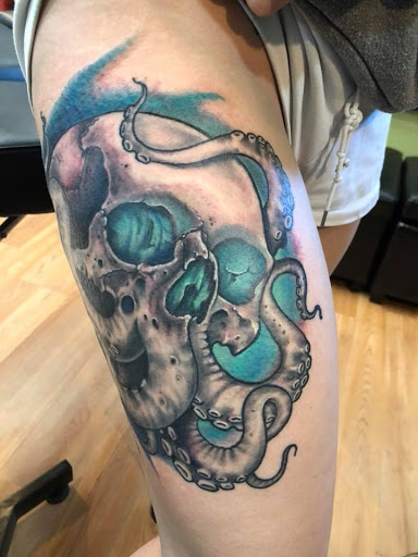 Explore otter tattoo ideas, creative tattoo ideas in Tarpon Springs, available at Legendary Custom Tattoos and Piercings