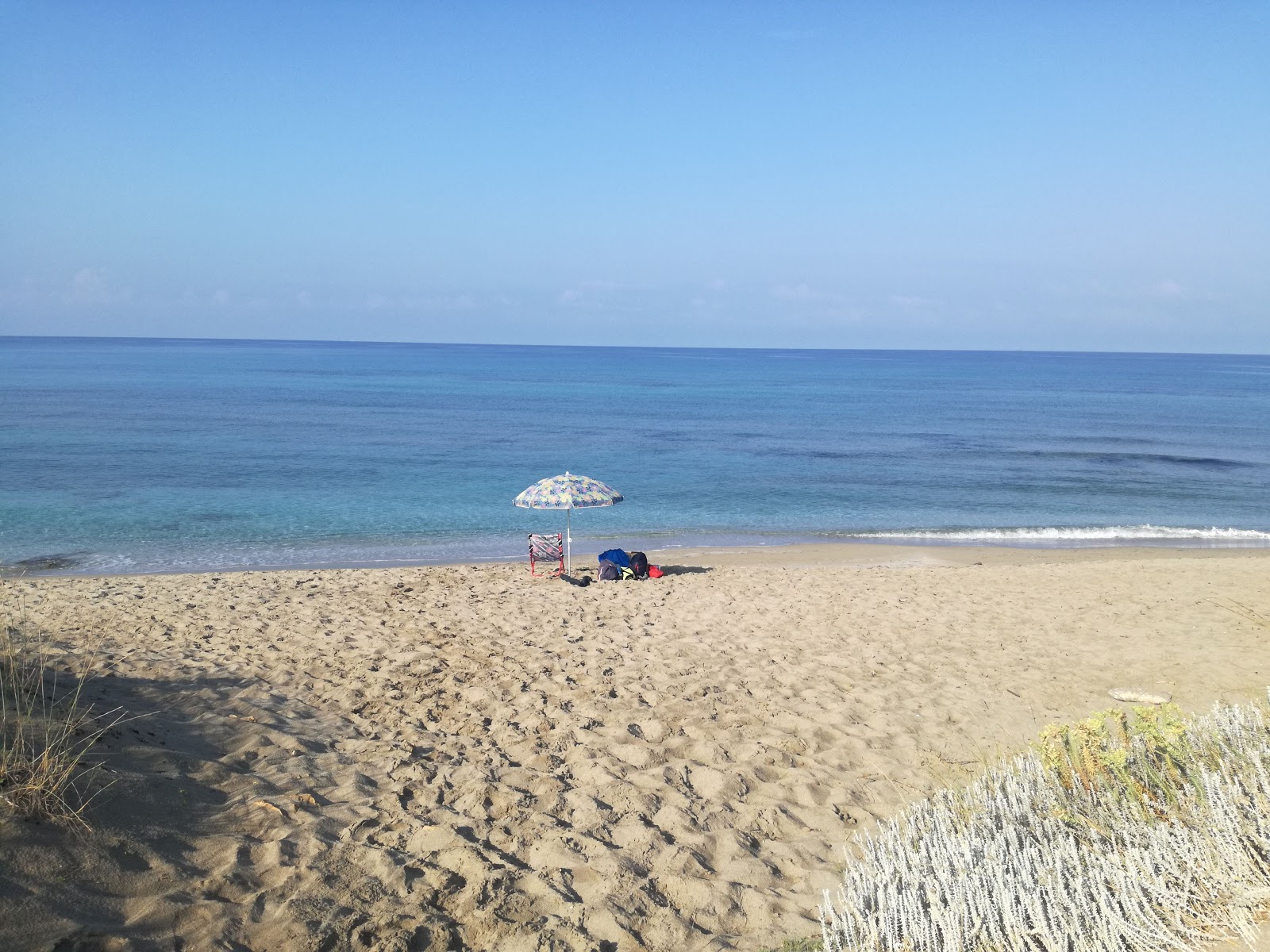 Foto av Spiaggia di Mare Morto och bosättningen