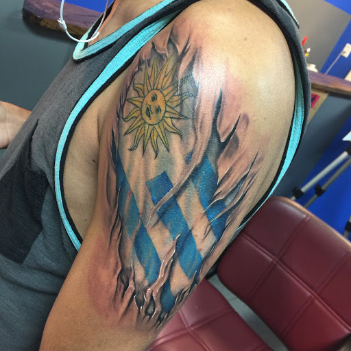 Explore aztec hand tattoo ideas, creative tattoo ideas in Corona, available at Crop Circles Tattoo Studio