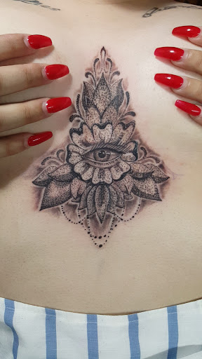 Explore rip neck tattoo ideas, creative tattoo ideas in Bakersfield, available at Bakersfield Tattoo & Piercing