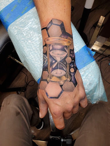 Explore tattoo ideas arm sleeve, creative tattoo ideas in Peoria, available at Guerrilla Ink Tattoos