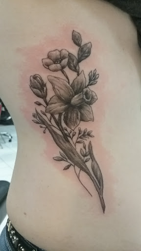 Explore alice in wonderland tattoo ideas, creative tattoo ideas in Walla Walla, available at Tatmandu