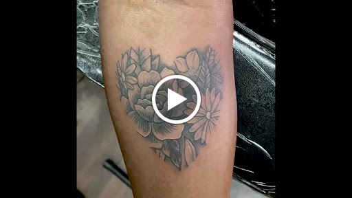 Explore survivor tattoo ideas, creative tattoo ideas in Douglasville, available at Long Island Ink Tattoo & Piercing