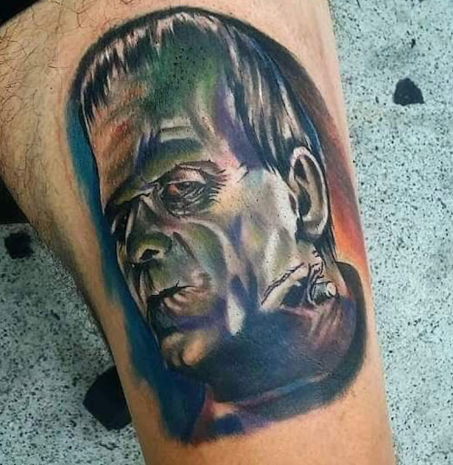 Explore autism puzzle piece tattoo ideas, creative tattoo ideas in Orange, available at Ink Activitiez Tattoo