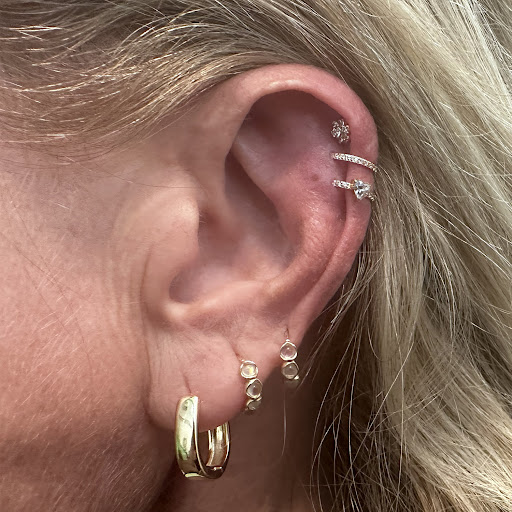 Explore outer space tattoo ideas, creative tattoo ideas in San Luis Obispo, available at Bodys & Jewelry Luxury Piercing