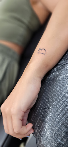 Explore skull and rose tattoo ideas, creative tattoo ideas in Lees Summit, available at The Cherry Bomb Tattoo Co.