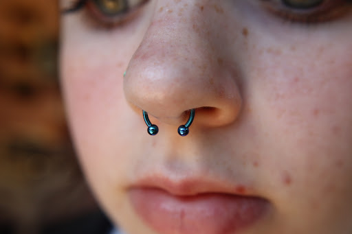 Explore cyber y2k tattoo ideas, creative tattoo ideas in Mobile, available at Royal Stone Piercing