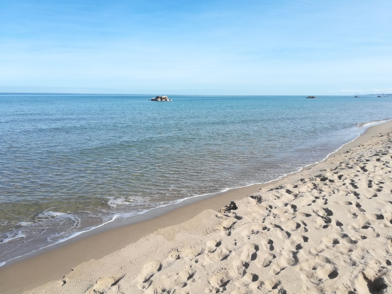 Photo de Marina di Petacciato avec sable fin brun de surface