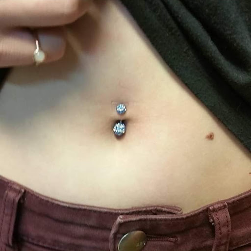 Explore mens filler tattoo ideas, creative tattoo ideas in Elko, available at Custom Tattoos and Body Piercing Studio