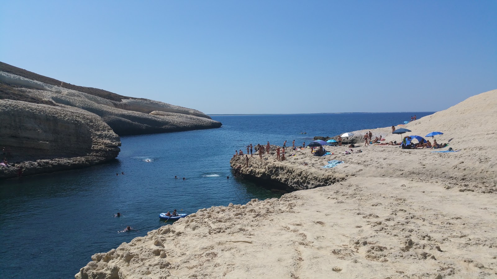 Photo of Secret beach with turquoise pure water surface