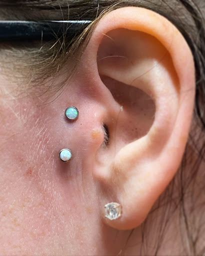 Explore tattoo ideas side, creative tattoo ideas in Oswego, available at Bodified