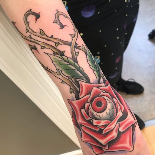 Explore caterpillar tattoo ideas, creative tattoo ideas in Virginia Beach, available at Studio Evolve