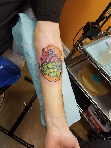Explore new years tattoo ideas, creative tattoo ideas in Lockport, available at Tattoo City by Larry Brogan