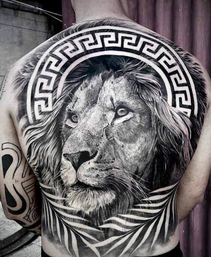 Explore spine tattoo ideas for men, creative tattoo ideas in Ocala, available at Lucky Bucks Tattoo Piercing Studio (APPT BASED)