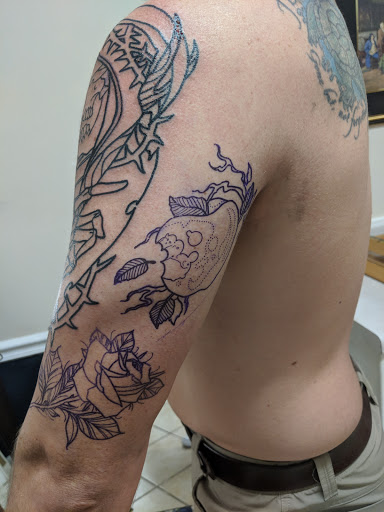 Explore bouquet tattoo ideas, creative tattoo ideas in Auburn, available at Against All Odds Tattoo