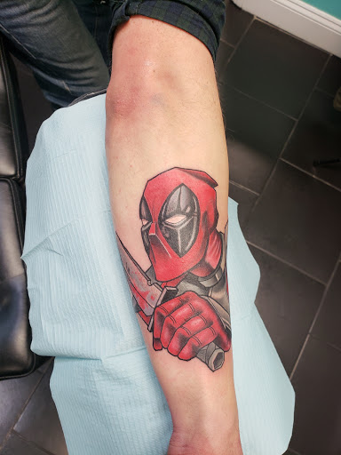 Explore back of arm tattoo ideas, creative tattoo ideas in Toms River, available at Drop N Ink Tattoo Shop