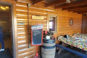 Linda's Log Cabin Inn image
