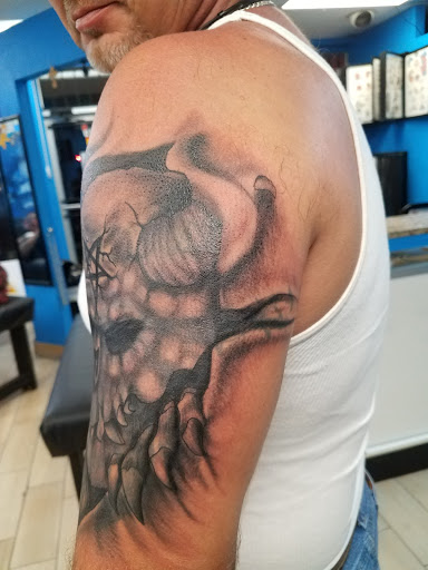 Explore looney tunes tattoo ideas, creative tattoo ideas in Houston, available at Orlandos Tattoo Studio