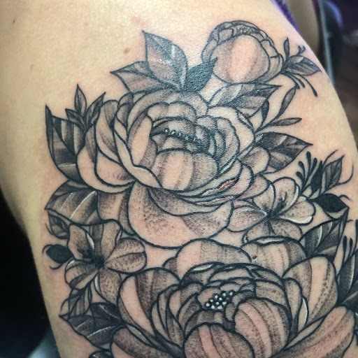 Explore wrist tattoo ideas for guys, creative tattoo ideas in Wake Forest, available at Revelation Ink Tattoo and Piercing