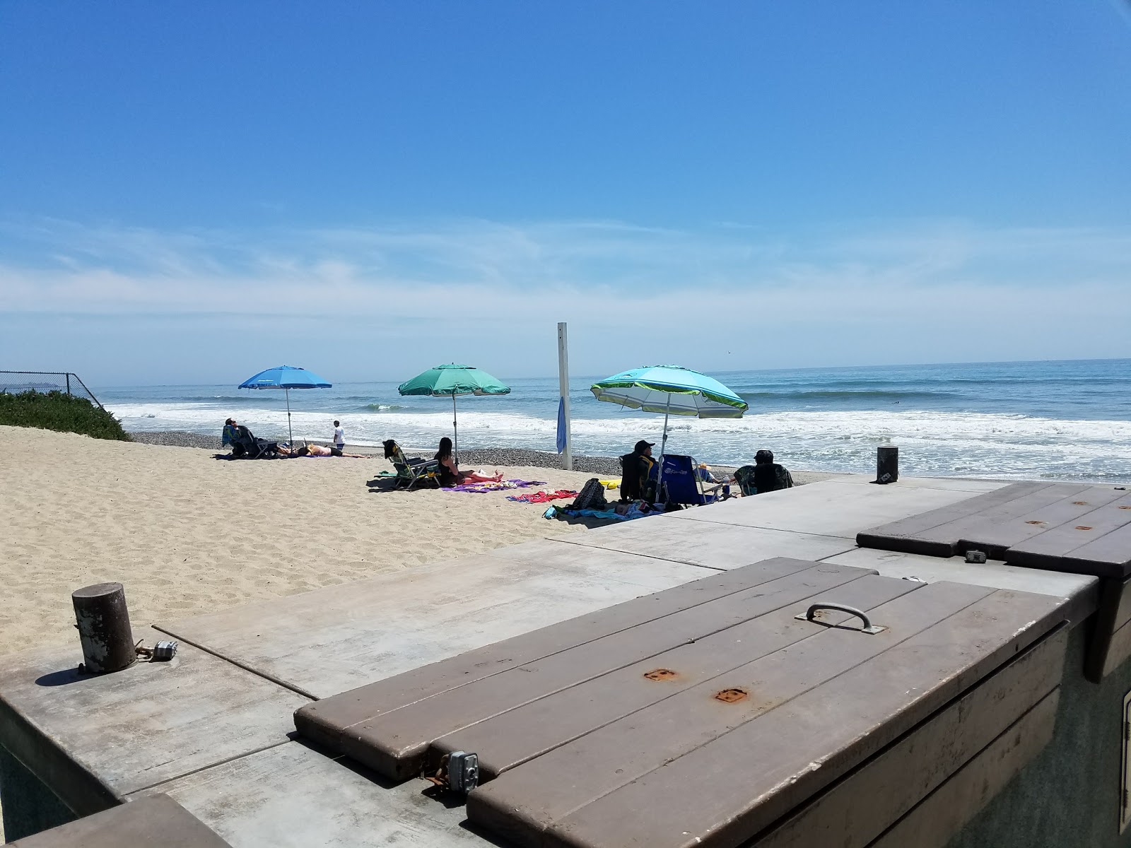 Poche beach'in fotoğrafı çakıl ile kum yüzey ile
