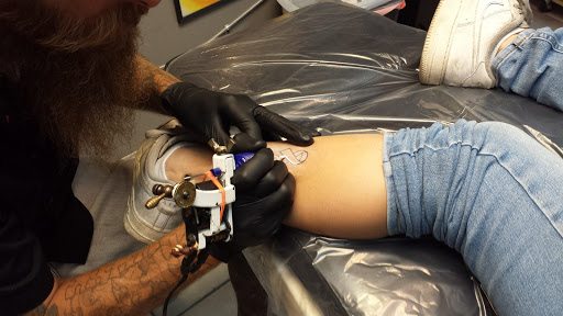 Explore colorful sleeve tattoo ideas, creative tattoo ideas in Bradenton, available at Memory Lane Tattoo Co.