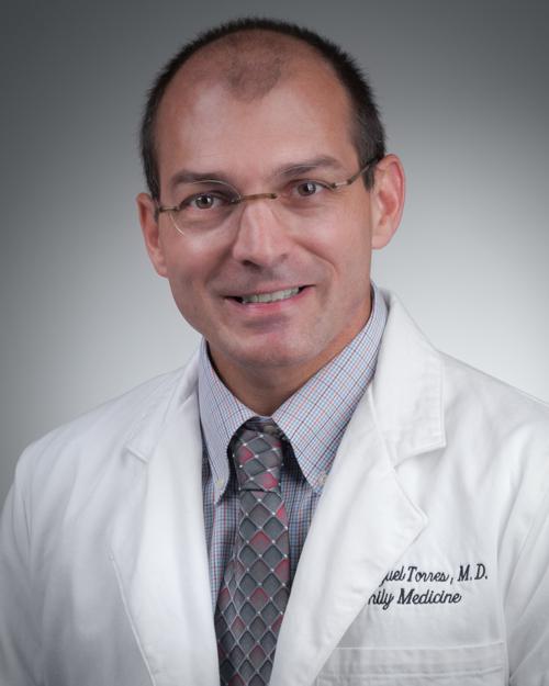 Dr. Carlos Torres