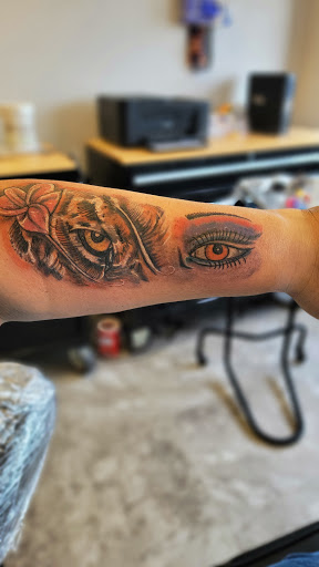 Explore round tattoo ideas, creative tattoo ideas in Seymour, available at American Gypsy Tattoo Corp.