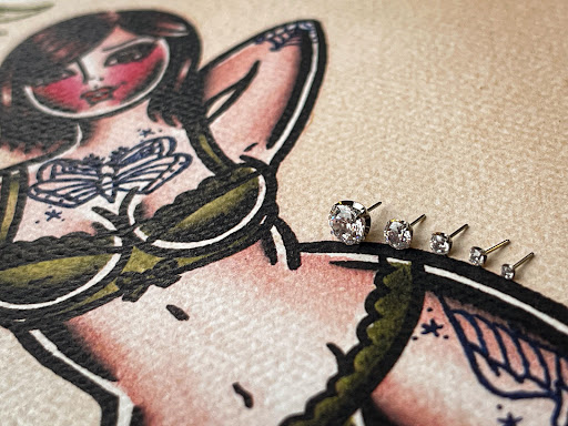 Explore small car tattoo ideas, creative tattoo ideas in Cedar Falls, available at Omega Red Piercing & Tattoo