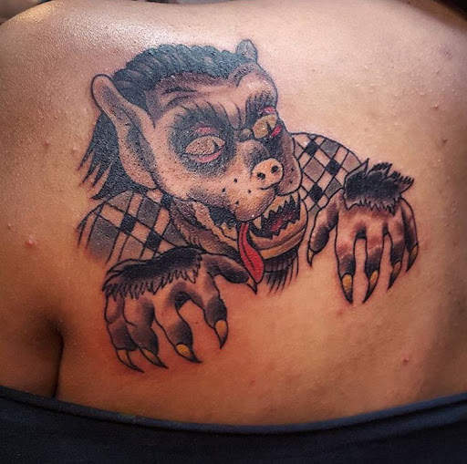 Explore cute neck tattoo ideas, creative tattoo ideas in San Diego, available at Sideshow Tattoo and Piercing