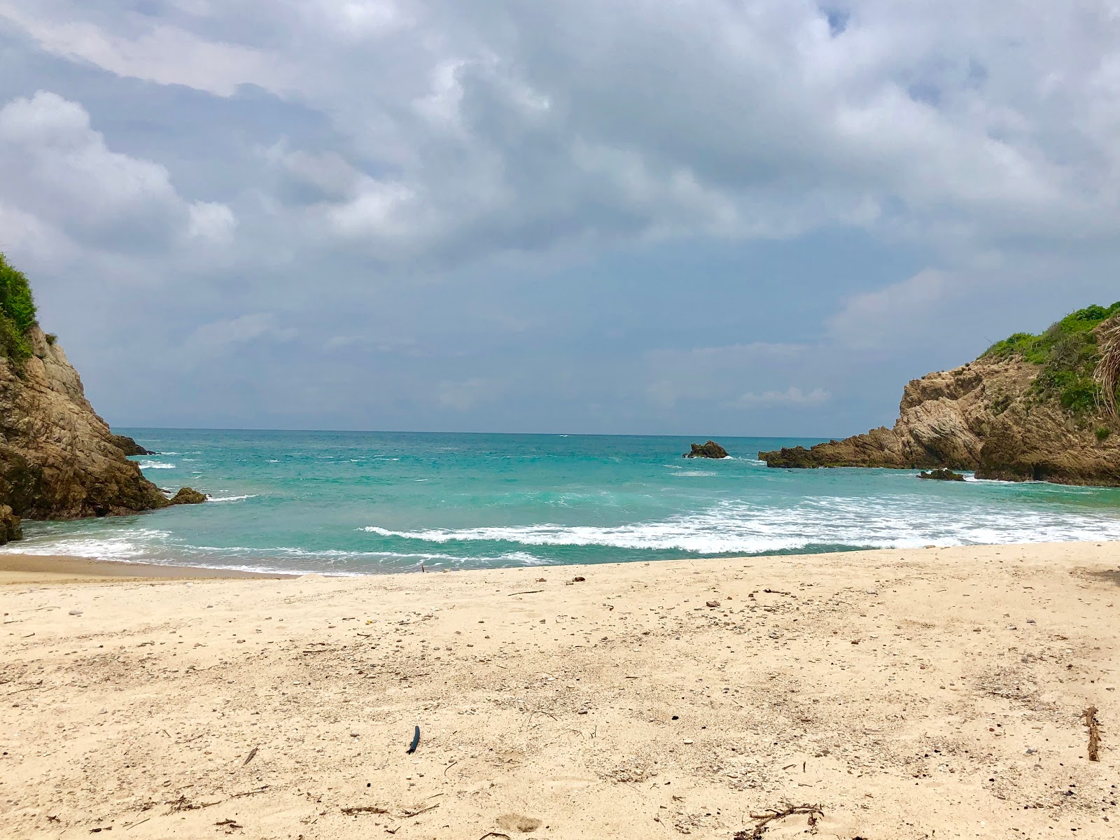Foto di Playa Joberito con una superficie del sabbia beige