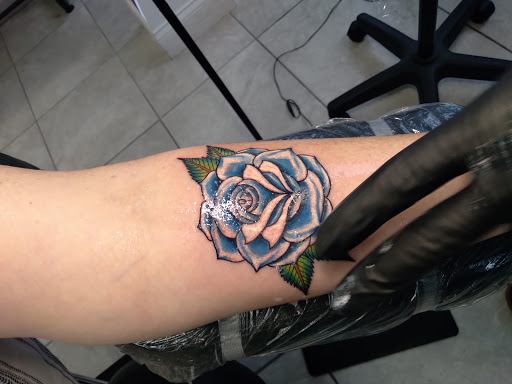 Explore axe tattoo ideas, creative tattoo ideas in Daytona Beach, available at Studio 21 Tattoo & Piercings Daytona Beach