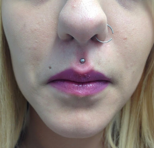 Explore thyroid tattoo ideas, creative tattoo ideas in Richmond, available at Lucky Lady Tattoos