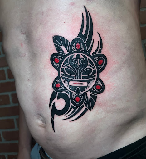 Find lock and key tattoo ideas for your next unique tattoo in Kissimmee at Fallen Heroes Tattoo & Piercing (Florida)