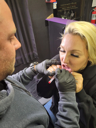 Explore mens hand tattoo ideas, creative tattoo ideas in Las Vegas, available at Work of Art Tattoo and Piercing