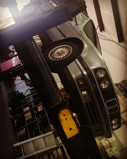 Auto Repair Shop «Mad Hatter Auto Repairs and Mufflers», reviews and photos, 4916 W Linebaugh Ave #101, Tampa, FL 33624, USA