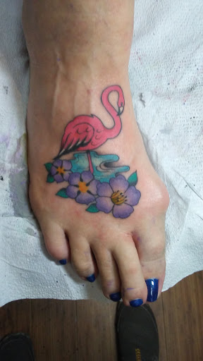 Explore ear tattoo ideas, creative tattoo ideas in Whiting, available at Lucky Kat Tat