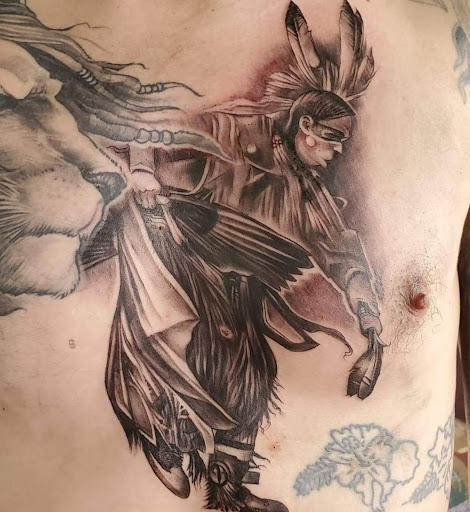 Find tattoo ideas for under the breast for your next unique tattoo in Pahoa at Electric Jungle Tattoo