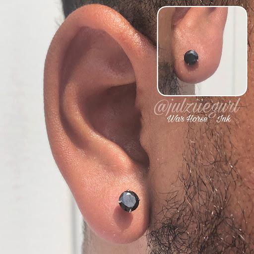 Explore tattoo ideas for stretch marks, creative tattoo ideas in Kent, available at War Horse Ink