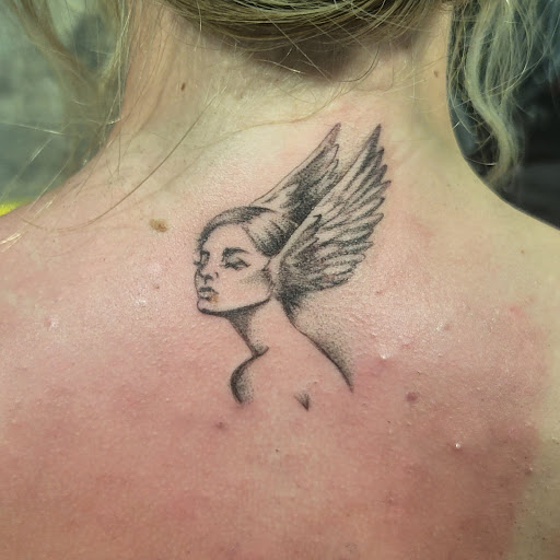 Explore mens spine tattoo ideas, creative tattoo ideas in San Diego, available at Goddess Temple Tattoo Studio