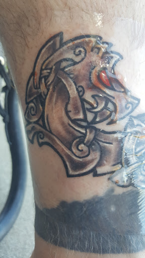 Find tattoo under breast ideas for your next unique tattoo in Wenatchee at Rebels Tattoo Studio