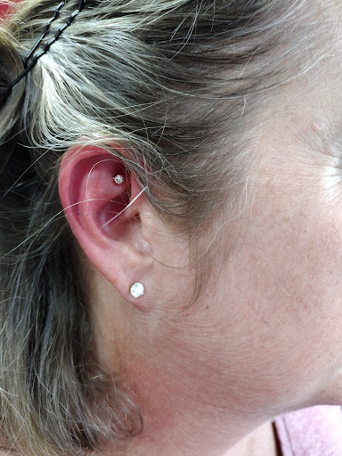Explore barn owl tattoo ideas, creative tattoo ideas in Altoona, available at Piercings by Pez