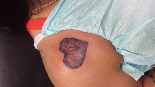 Explore small dove tattoo ideas, creative tattoo ideas in Bowman, available at iTat Tattoo Studio